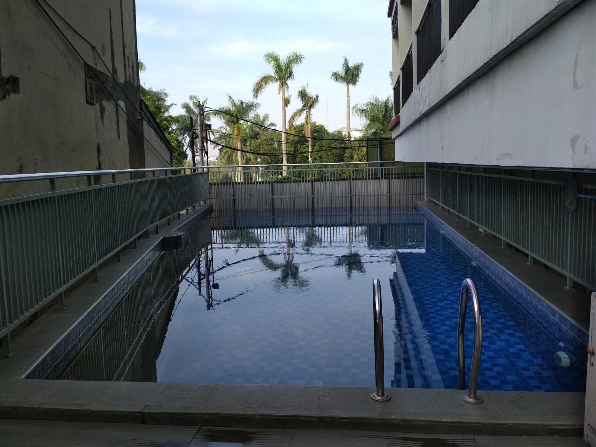 Apartemen Homey At 6th Floor Beverly Dago By Travelio *